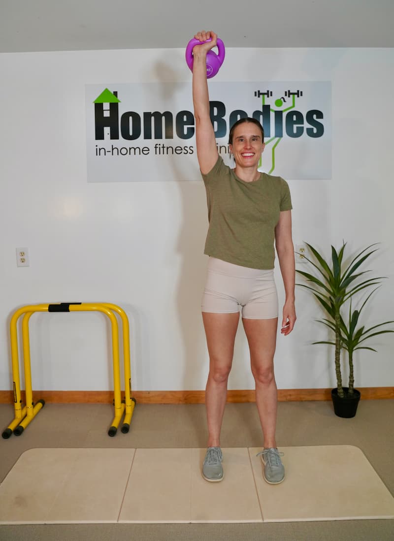 gina paulhus performing an arm workout